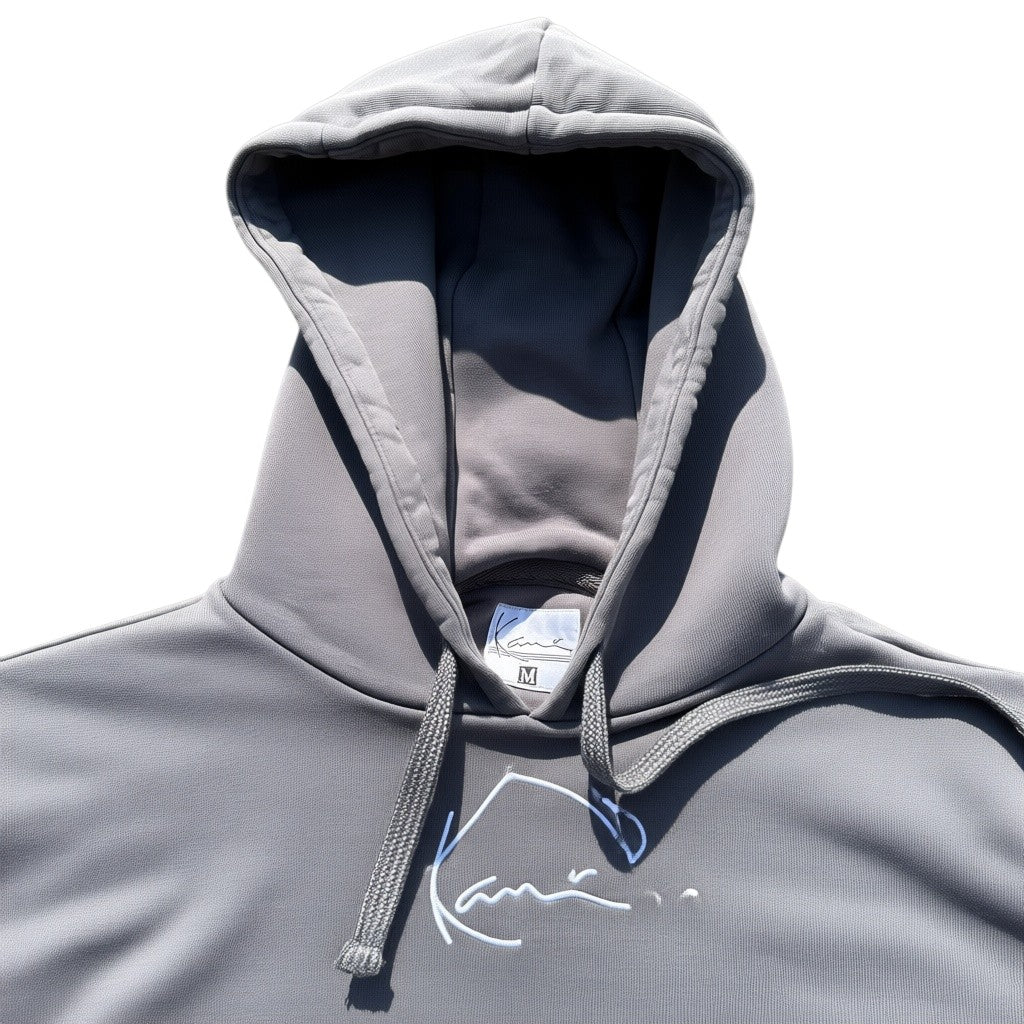 Karl Kani Größenetikett M am grauen Hoodie
